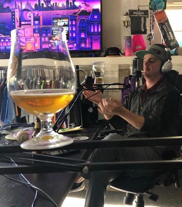 Danny Corbett balancing beer on the disc golf podcast Jammin' With The Best.